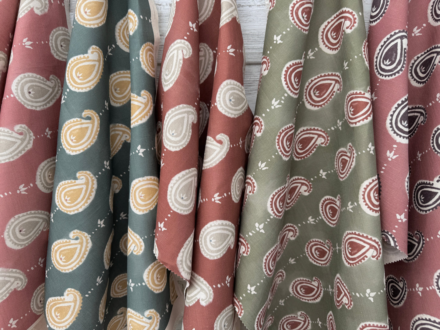 Paisley linen cotton union fabric in Sea Green and Yellow