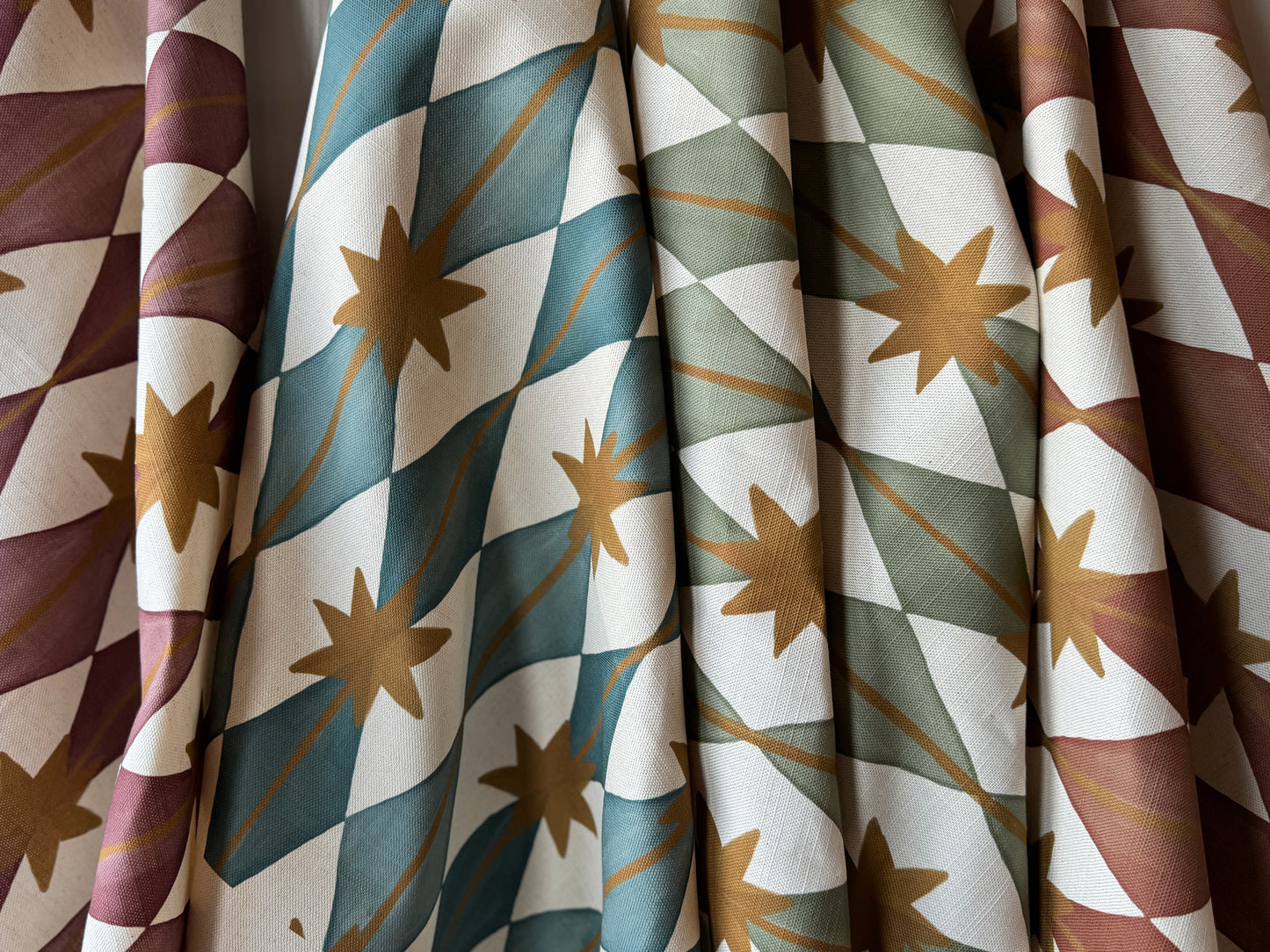 Starfall printed cotton, linen union fabric in Raspberry