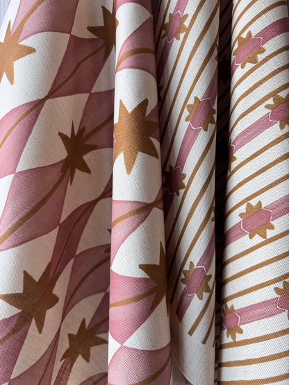 Starfall printed cotton, linen union fabric in Pink