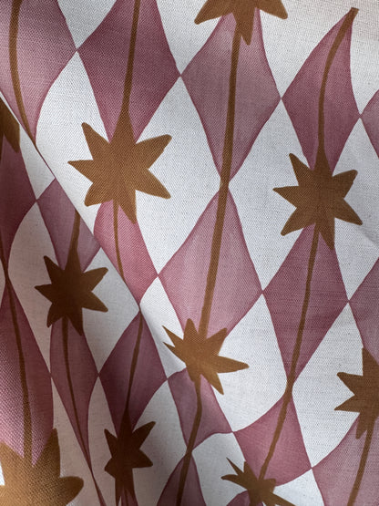 Starfall printed cotton, linen union fabric in Pink