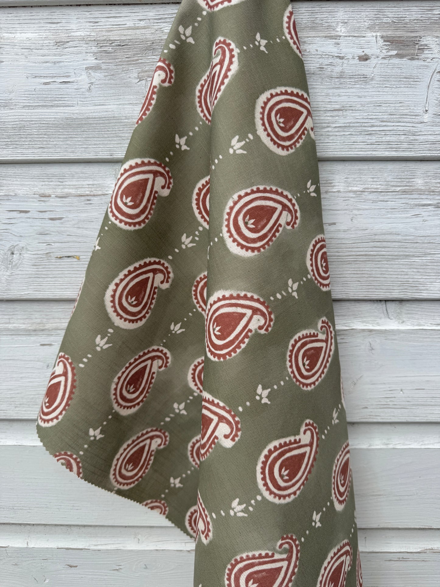 Paisley linen cotton union fabric in Green and Terracotta