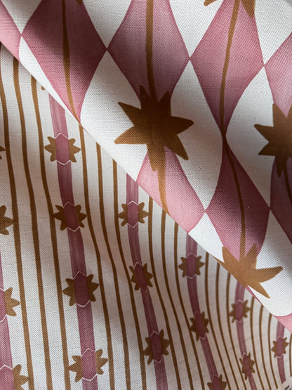 Starfall printed cotton, linen union fabric in Pink