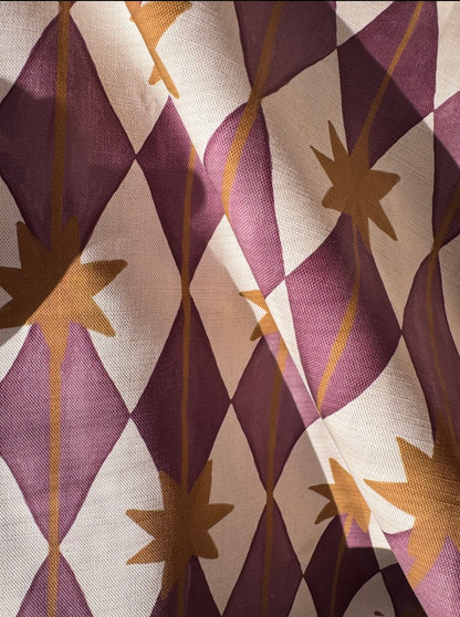 Starfall printed cotton, linen union fabric in Blackcurrant