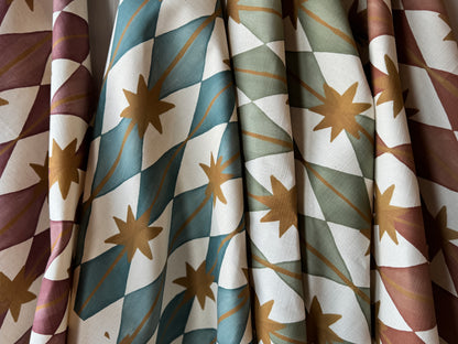 Starfall printed cotton, linen union fabric in Blue